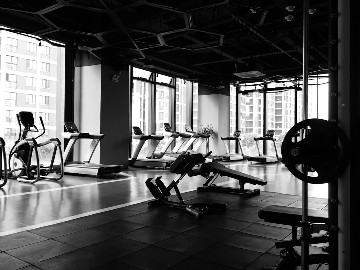 Athlete training in a dark gym